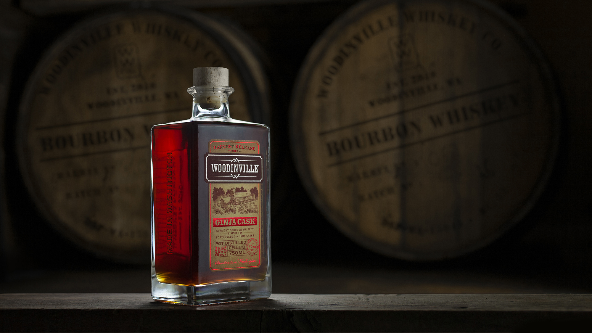 Woodinville Bourbon Ginja Finish Harvest Release 2023 bottle and barrels